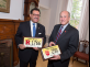 President Barchi and Raymond Martinez, chief administrator of the New Jersey Motor Vehicle Commission, with specialized license plates honoring Rutgers’ 250th anniversary